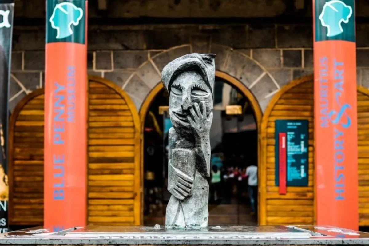 The stone facade of the Blue Penny Museum at Caudan Waterfront, Port Louis