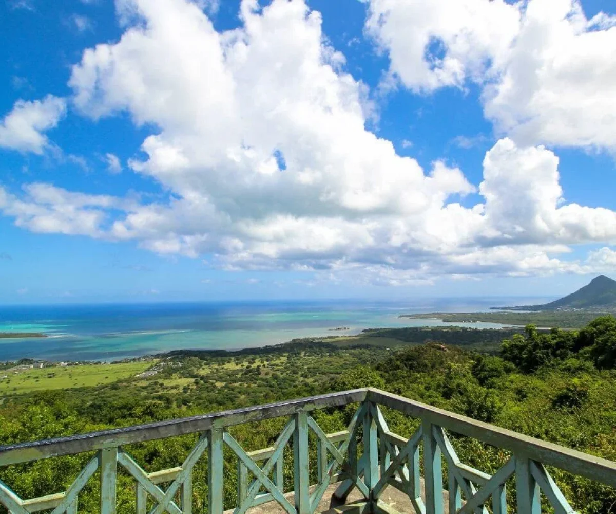 Panoramic view from Chamarel Viewpoint over the south-west coast of Mauritius towards Le Morne Brabant