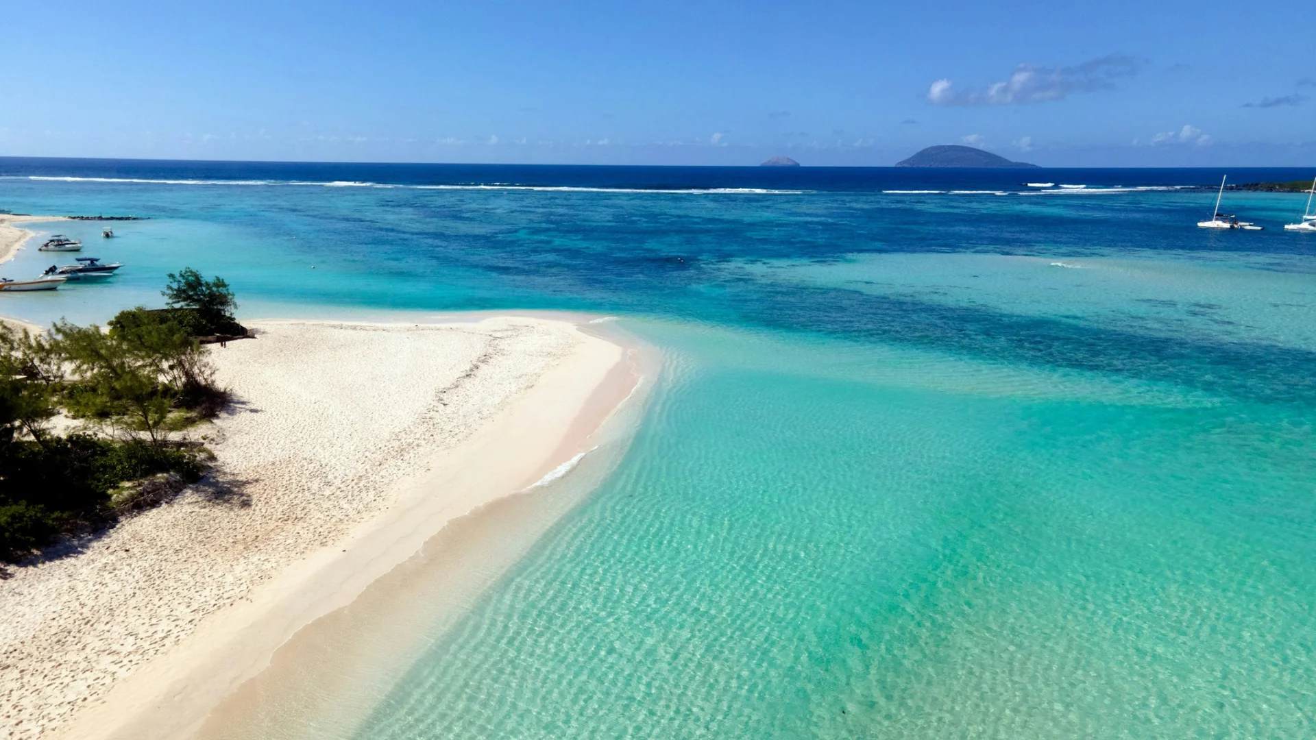 The lighthouse and turquoise lagoon of Flat Island off the north coast of Mauritius