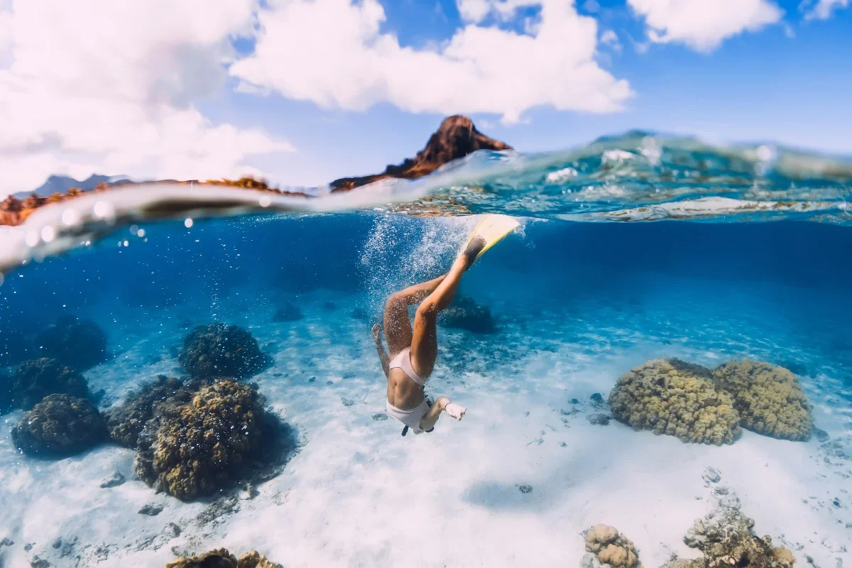 Snorkelling over coral in a Mauritian lagoon