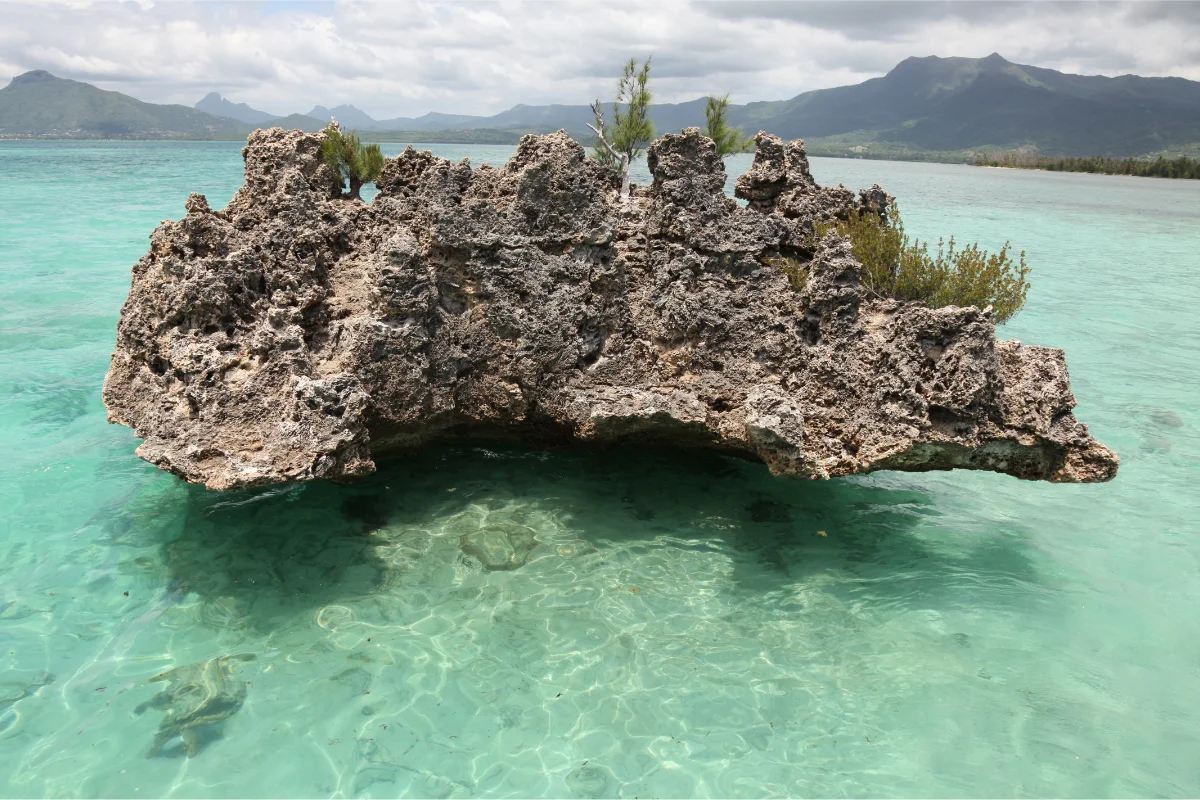 Crystal Rock in the lagoon with Île aux Bénitiers behind it, west Mauritius