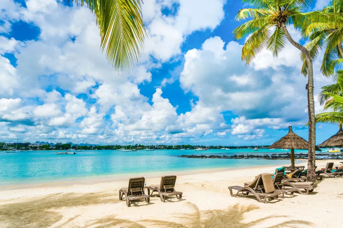 Boats moored in the sheltered turquoise bay at Grand Baie, northern Mauritius